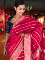 Pink Banarasi Silk Saree in Georgette highlighted with Pichwai Weaves
