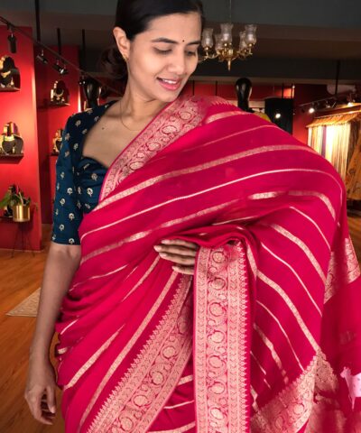 Pink Banarasi Silk Saree in Georgette highlighted with Pichwai Weaves