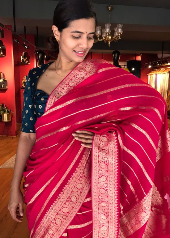 Pink Banarasi Silk Saree in Georgette highlighted with Pichwai Weaves