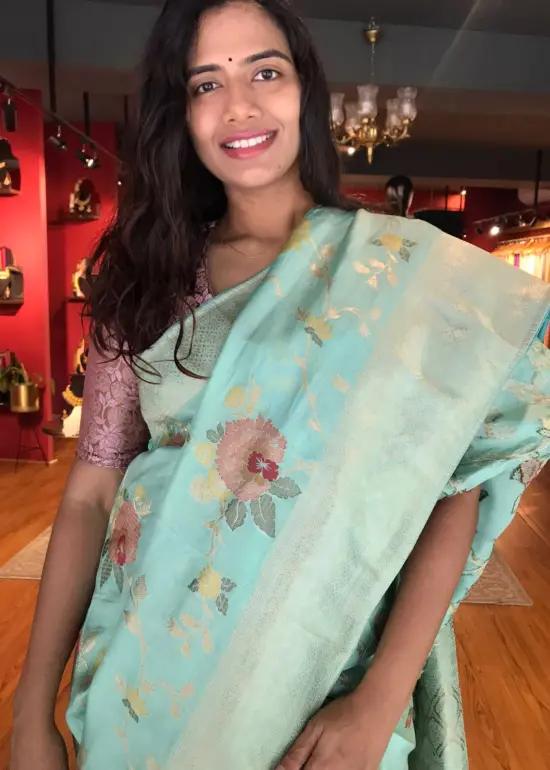 Pastel Green Muga Silk Saree with Beautiful Meenakari Weaves highlighted with Gold Zari