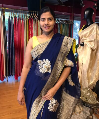 Midnight Blue Banarasi Silk Saree in Georgette highlighted with Woven Zari Buttas