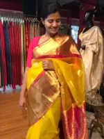 Yellow Organza Silk Saree highlighted with Kanchi Zari Border