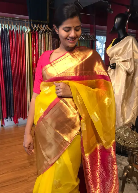 Yellow Organza Silk Saree highlighted with Kanchi Zari Border