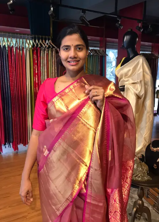 Onion Pink Organza Silk Saree highlighted with Kanchi Zari Border