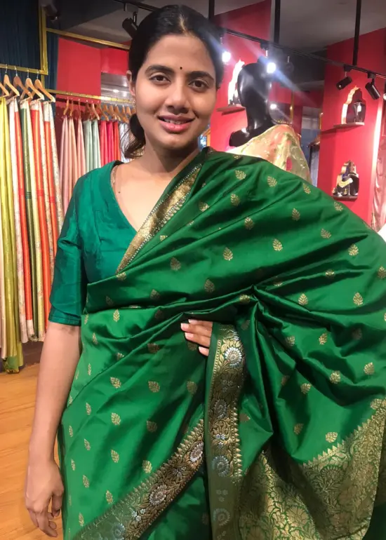 Bottle Green Banarasi Silk Saree highlighted with Gold Weaves