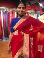 Red Banarasi Silk Saree in Georgette highlighted with Woven Zari Buttas