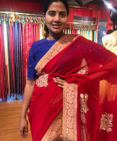 Red Banarasi Silk Saree in Georgette highlighted with Woven Zari Buttas