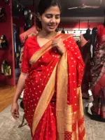 Red Crepe Silk Saree with Beautiful Gold Zari Buttas highlighted with Gold Woven Border