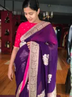 Purple Banarasi Silk Saree in Georgette highlighted with Woven Zari Buttas