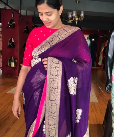 Purple Banarasi Silk Saree in Georgette highlighted with Woven Zari Buttas