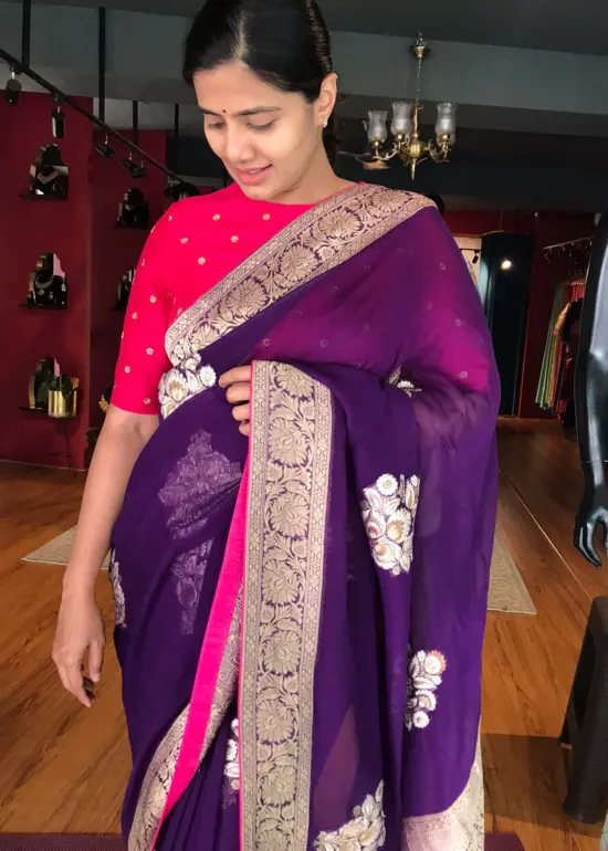 Purple Banarasi Silk Saree in Georgette highlighted with Woven Zari Buttas