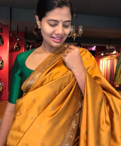 Mustard Banarasi Silk Saree highlighted with Gold Weaves