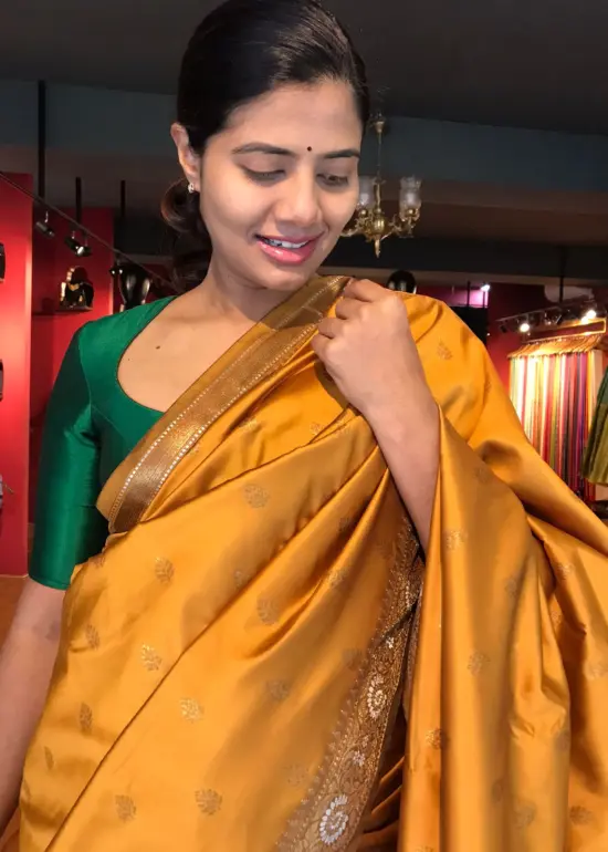 Mustard Banarasi Silk Saree highlighted with Gold Weaves