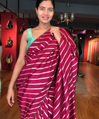 Wine Banarasi Silk Saree highlighted with Leheriya Weaves