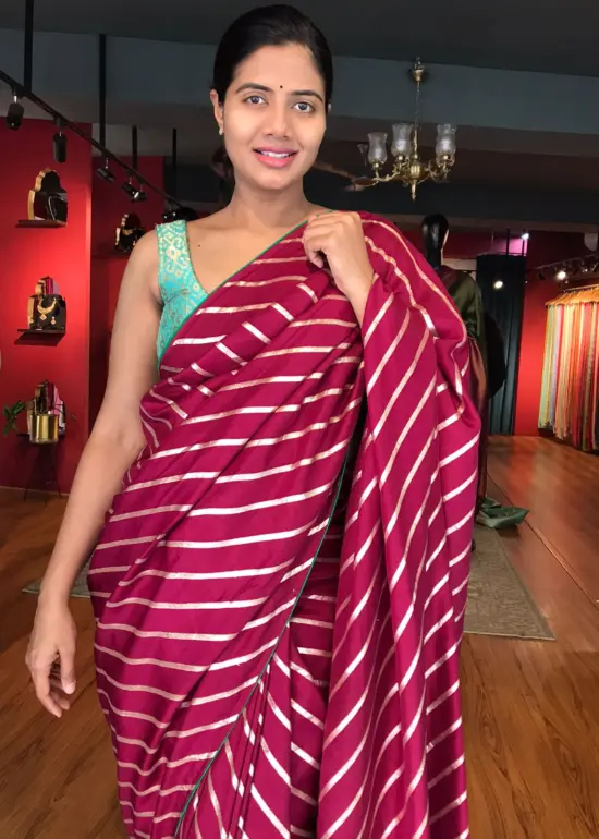 Wine Banarasi Silk Saree highlighted with Leheriya Weaves