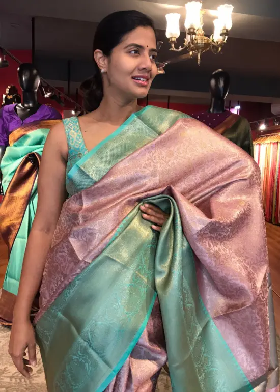 Onion Pink Kora Silk Saree highlighted with contrast woven border