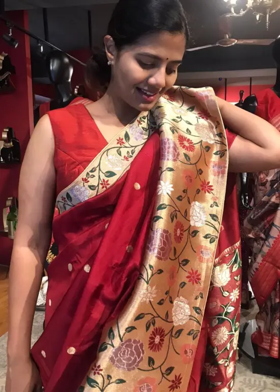 Maroon Crepe Silk Saree with Gold Zari Buttas highlighted with Paithani Weaves