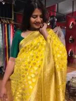 Yellow Banarasi Silk Saree in Georgette adorned with Gold Zari Weaves