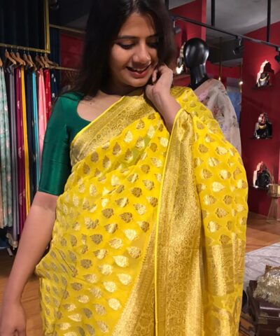 Yellow Banarasi Silk Saree in Georgette adorned with Gold Zari Weaves