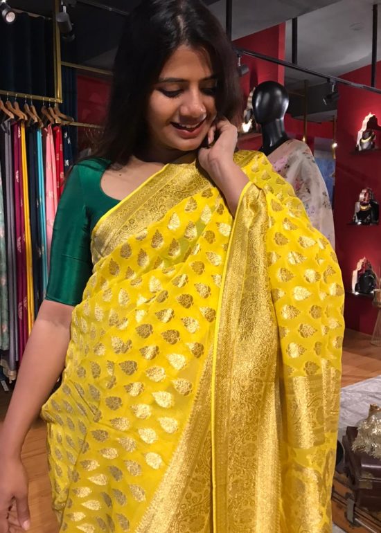 Yellow Banarasi Silk Saree in Georgette adorned with Gold Zari Weaves
