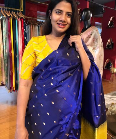 Royal Blue Kanjivaram Silk Saree highlighted with Gold Zari Buttas