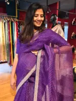 Purple Leheriya Organza Silk Saree highlighted with Hand Embroidered Border