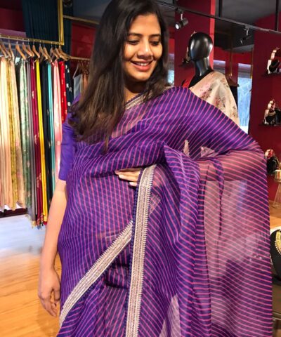 Purple Leheriya Organza Silk Saree highlighted with Hand Embroidered Border