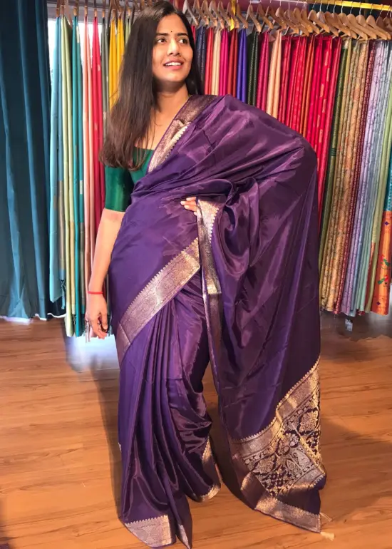 Purple Dola Silk Saree highlighted with Gold Zari Border