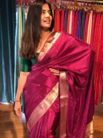 Dark Magenta Dola Silk Saree highlighted with Gold Zari Border