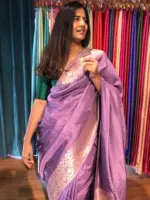 Lilac Dola Silk Saree highlighted with Gold Zari Border