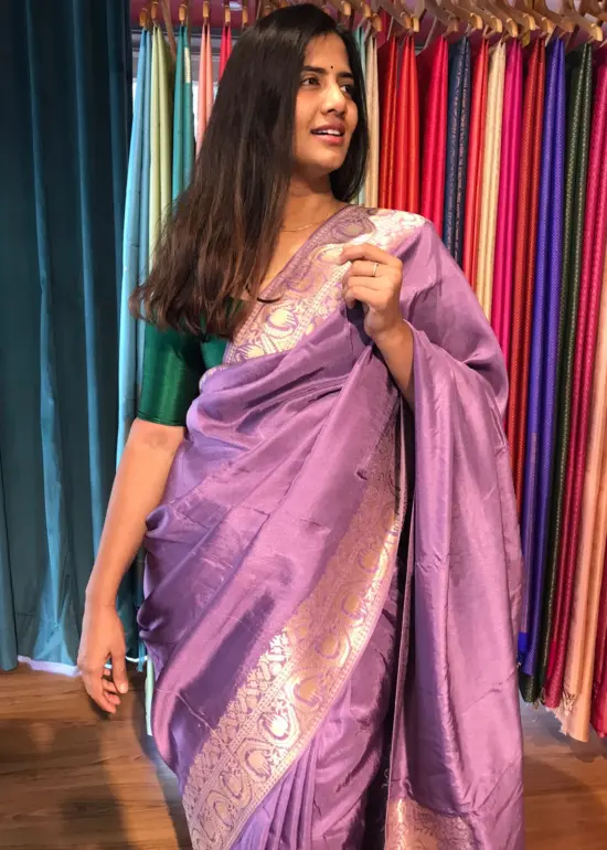 Lilac Dola Silk Saree highlighted with Gold Zari Border