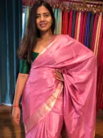 Pink Dola Silk Saree highlighted with Gold Zari Border