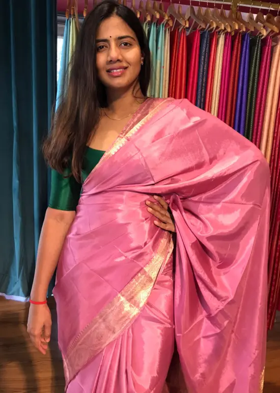 Pink Dola Silk Saree highlighted with Gold Zari Border