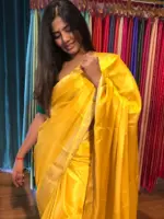 Golden Yellow Dola Silk Saree highlighted with Gold Zari Border