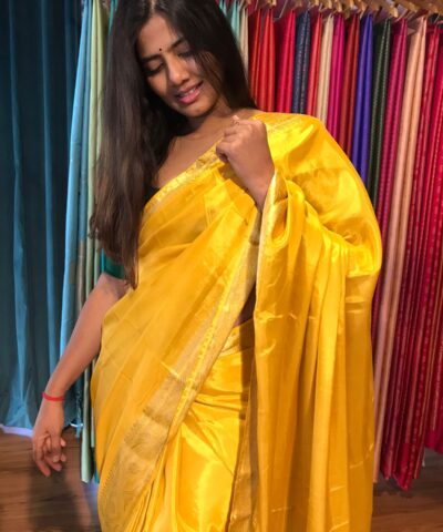 Golden Yellow Dola Silk Saree highlighted with Gold Zari Border