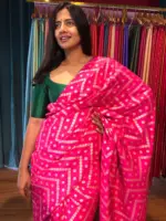 Rani Pink Dola Silk Saree highlighted with Zari Weaves