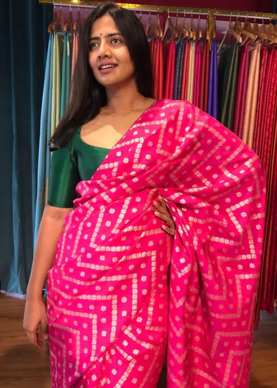 Rani Pink Dola Silk Saree highlighted with Zari Weaves