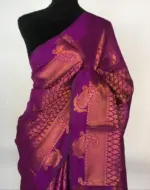 Majenta Pink Banarasi Silk Saree highlighted with zari weaves