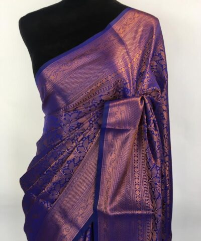 Blue Banarasi Silk Saree highlighted with zari weaves