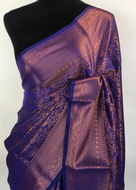 Blue Banarasi Silk Saree highlighted with zari weaves