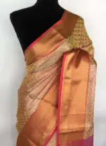 Yellow kora Silk Saree highlighted with zari weaves