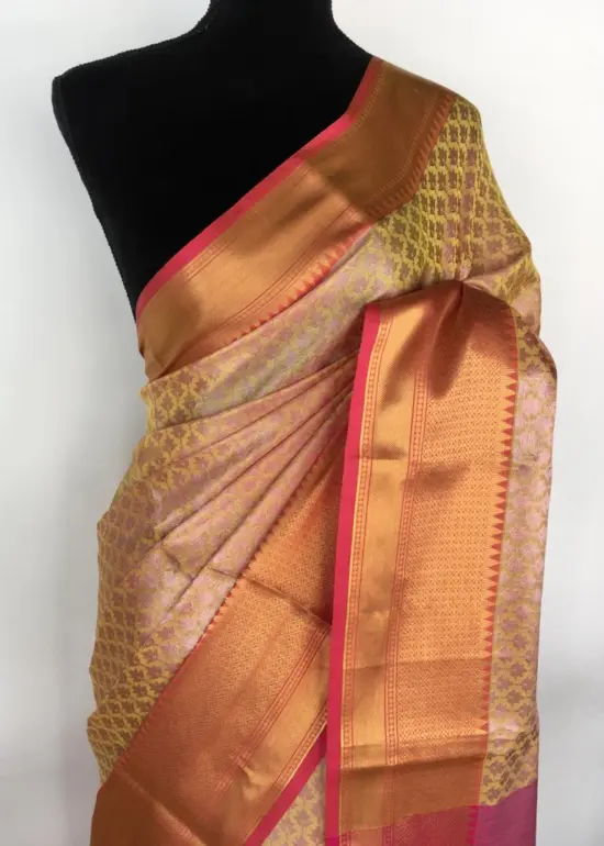 Yellow kora Silk Saree highlighted with zari weaves