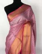 Pink kora Silk Saree highlighted with zari weaves