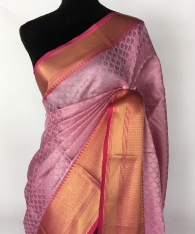 Pink kora Silk Saree highlighted with zari weaves
