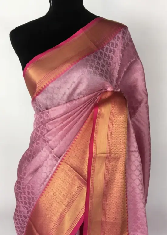 Pink kora Silk Saree highlighted with zari weaves