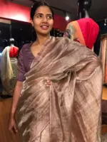 Mauve Tissue Silk Saree highlighted with Zari Checks