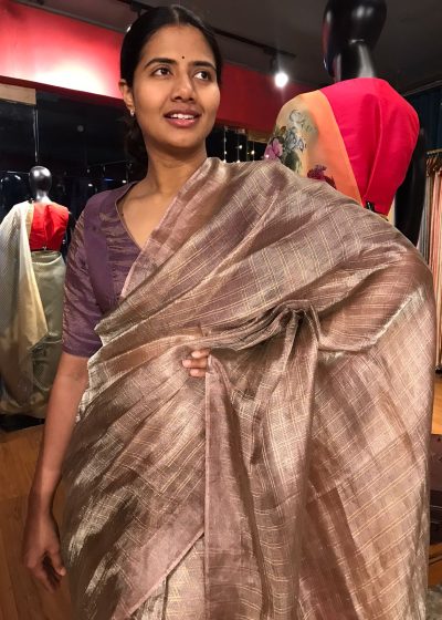 Mauve Tissue Silk Saree highlighted with Zari Checks