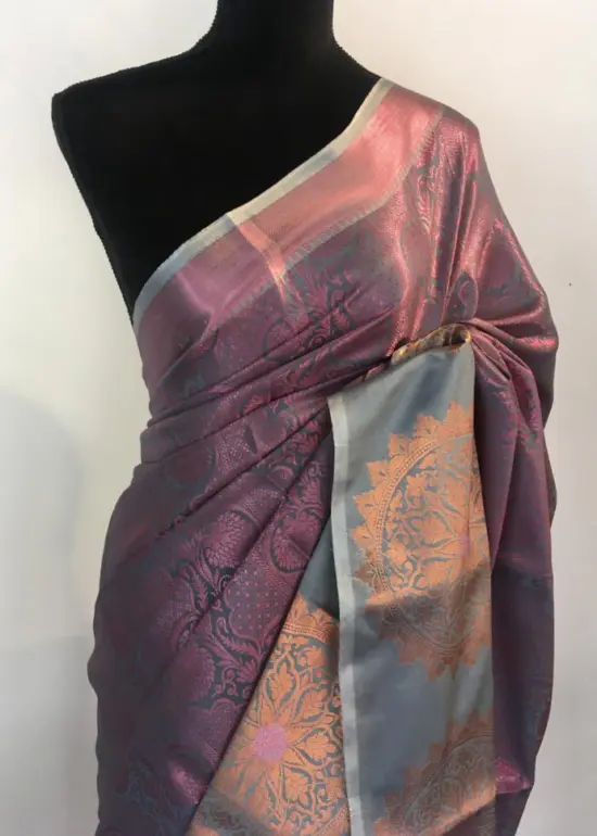 Purple Green Kora Silk Saree highlighted with zari weaves
