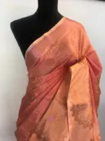 Peach Kora Silk Saree highlighted with zari weaves