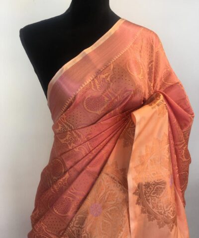 Peach Kora Silk Saree highlighted with zari weaves